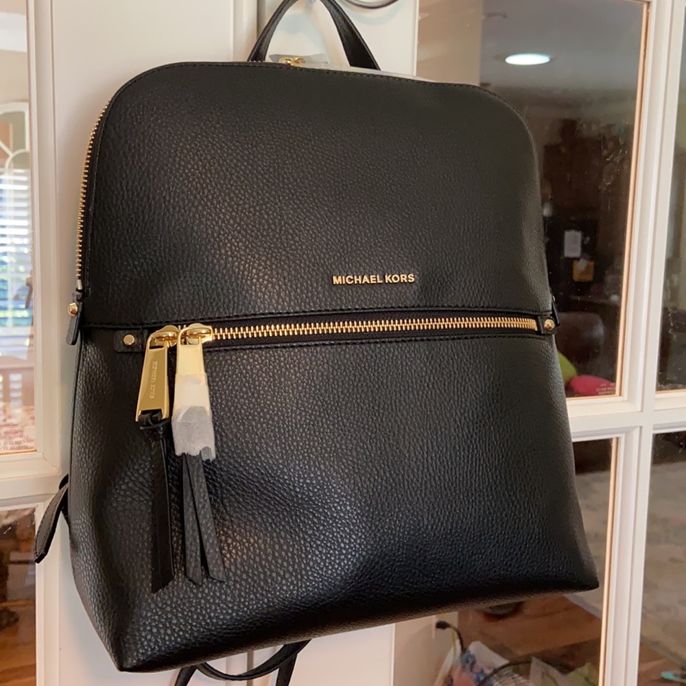 EUC Michael Kors Medium Black Leather Slim Backpack
